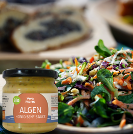 Bio Algen Honig Senf-Saucen vor einem Salat